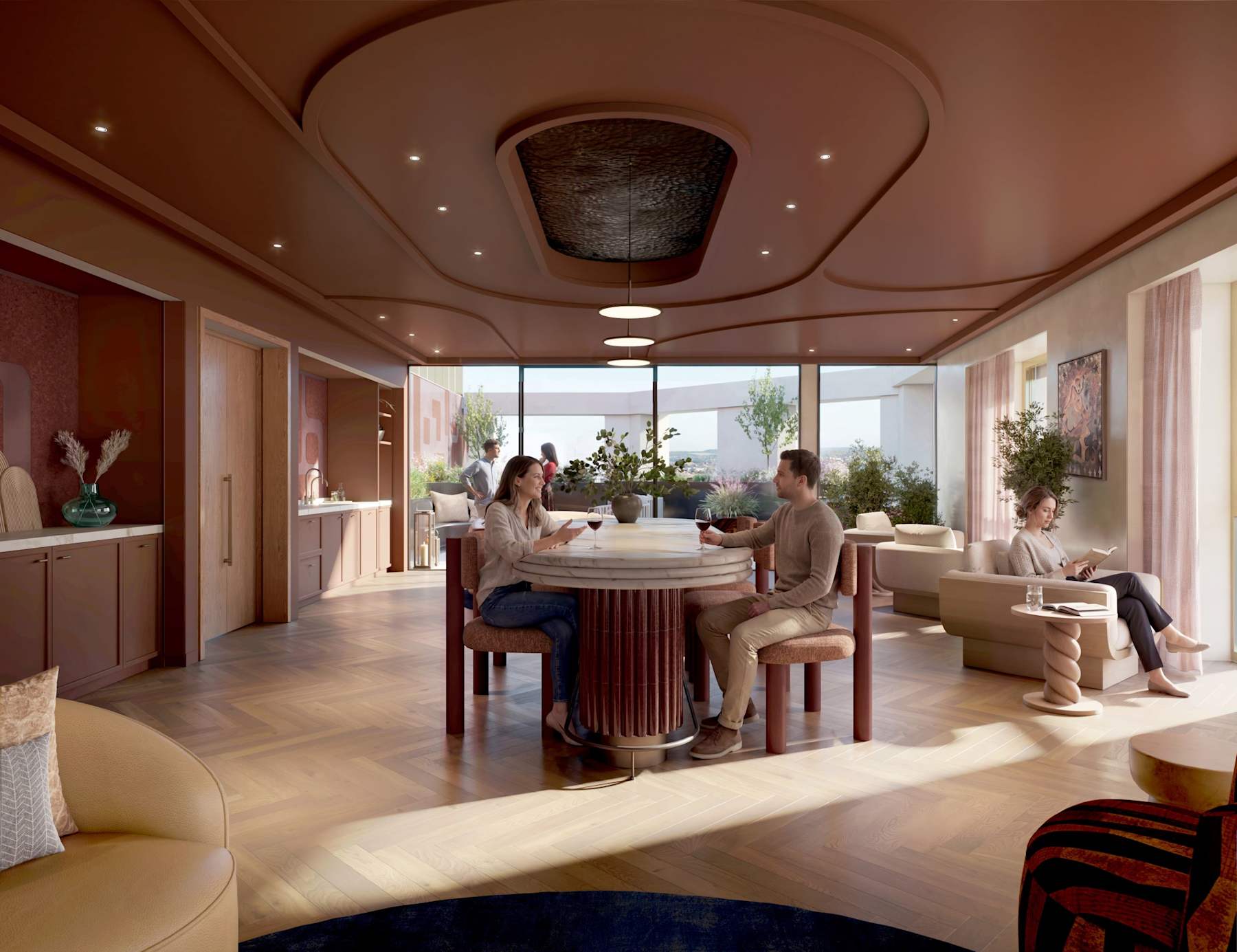 A group sitting around a table in the Solstice Club dining and drinks space